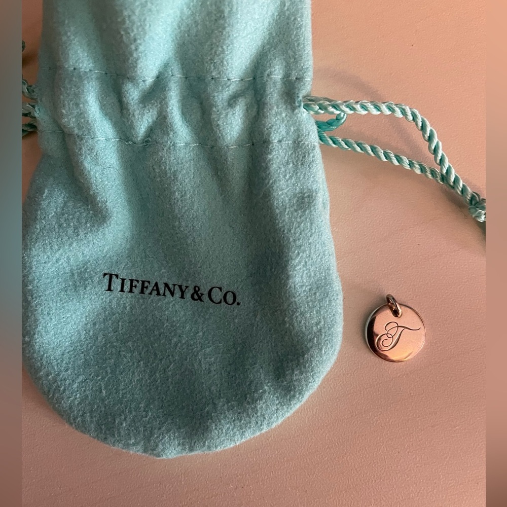 T initial pendant by Tiffany & Co.